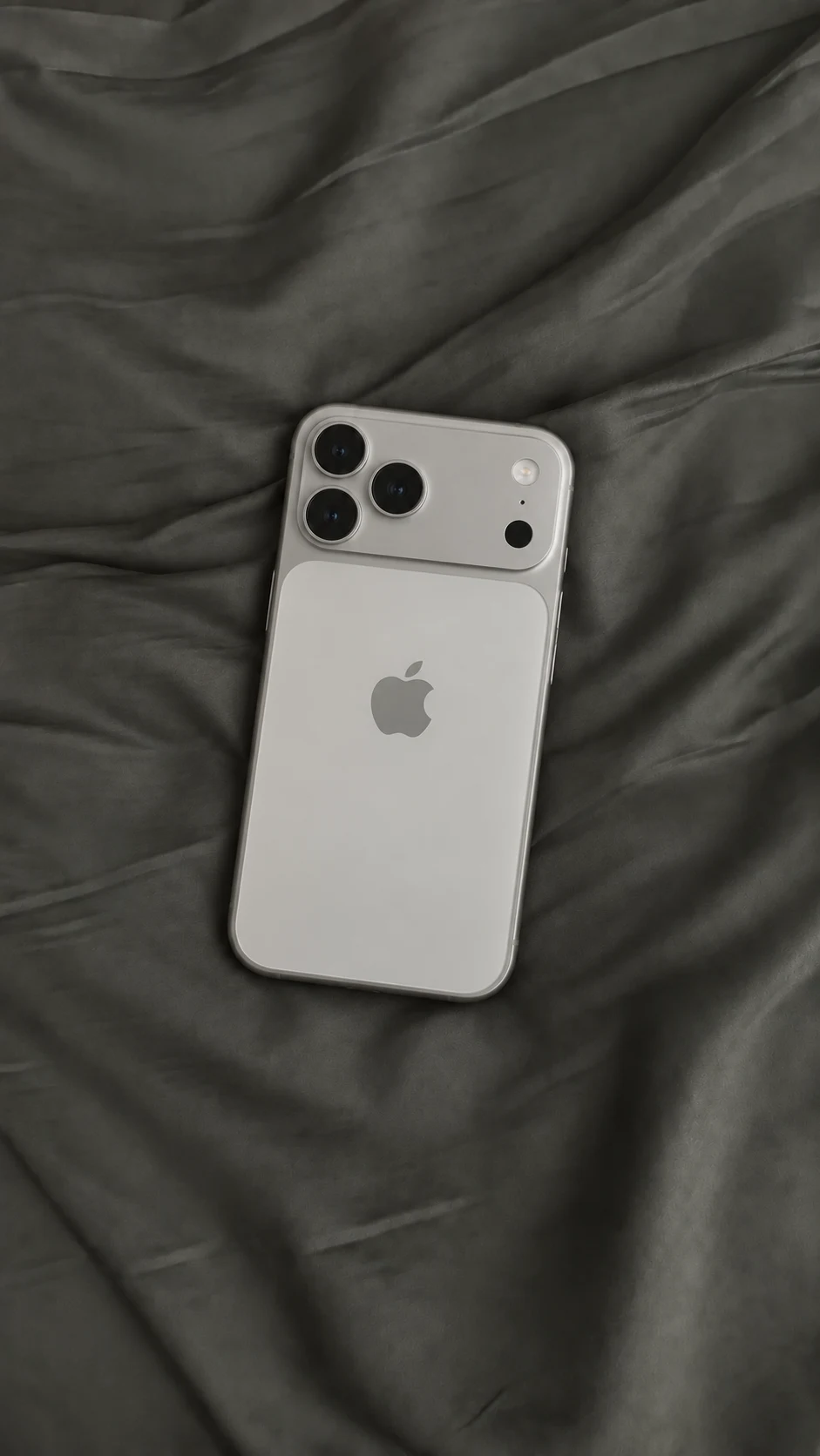 iPhone 17 Pro Max sobre tela gris