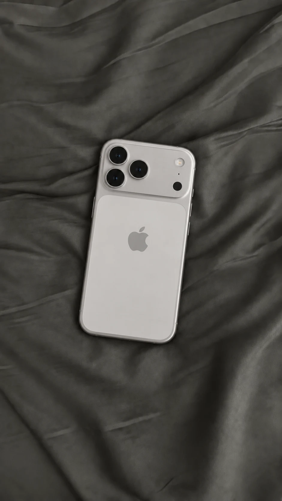 iPhone 17 Pro sobre tela gris